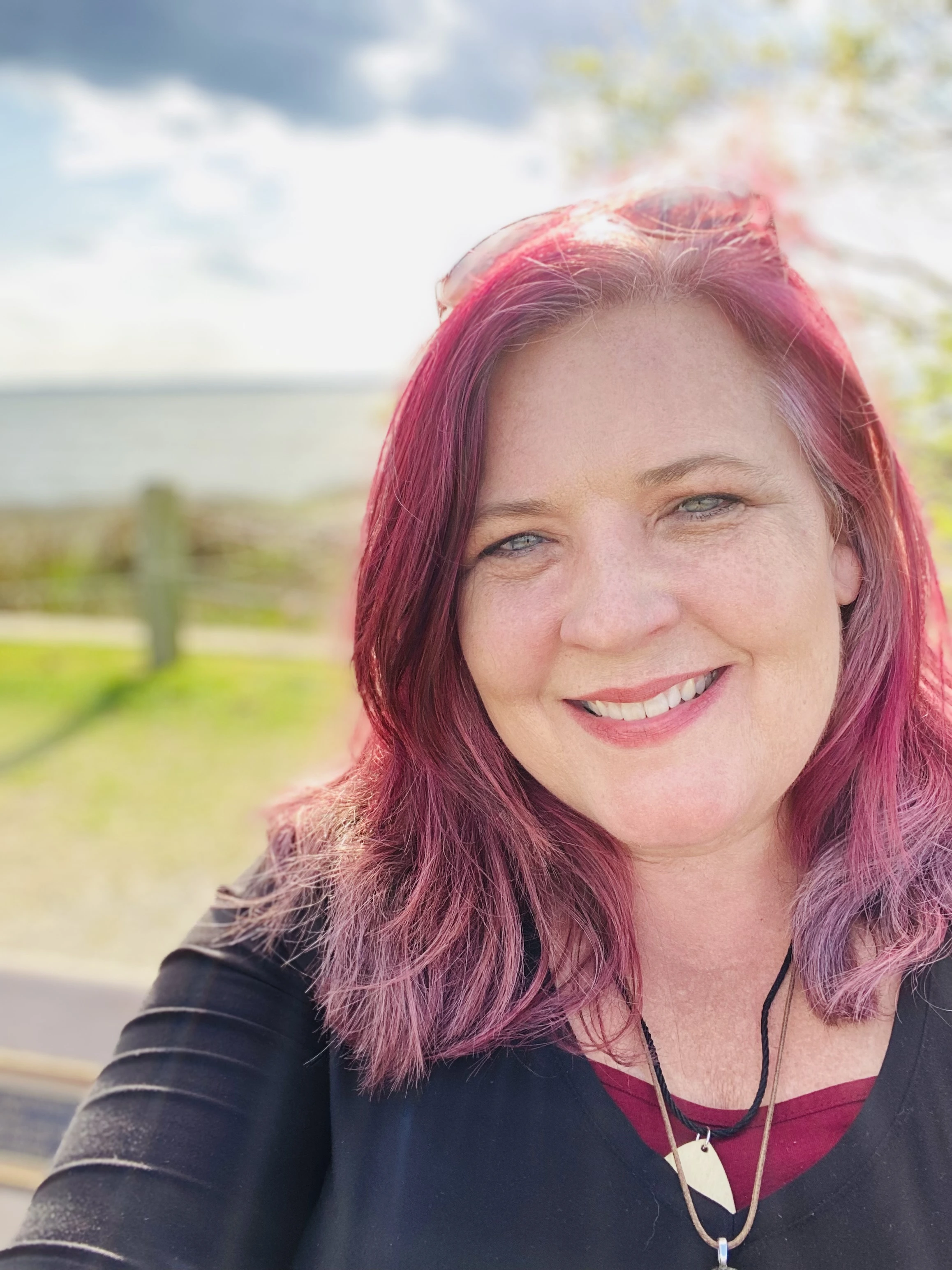 Gina Moore, co-founder of Kaleidoscope of Heart, outdoors in natural light